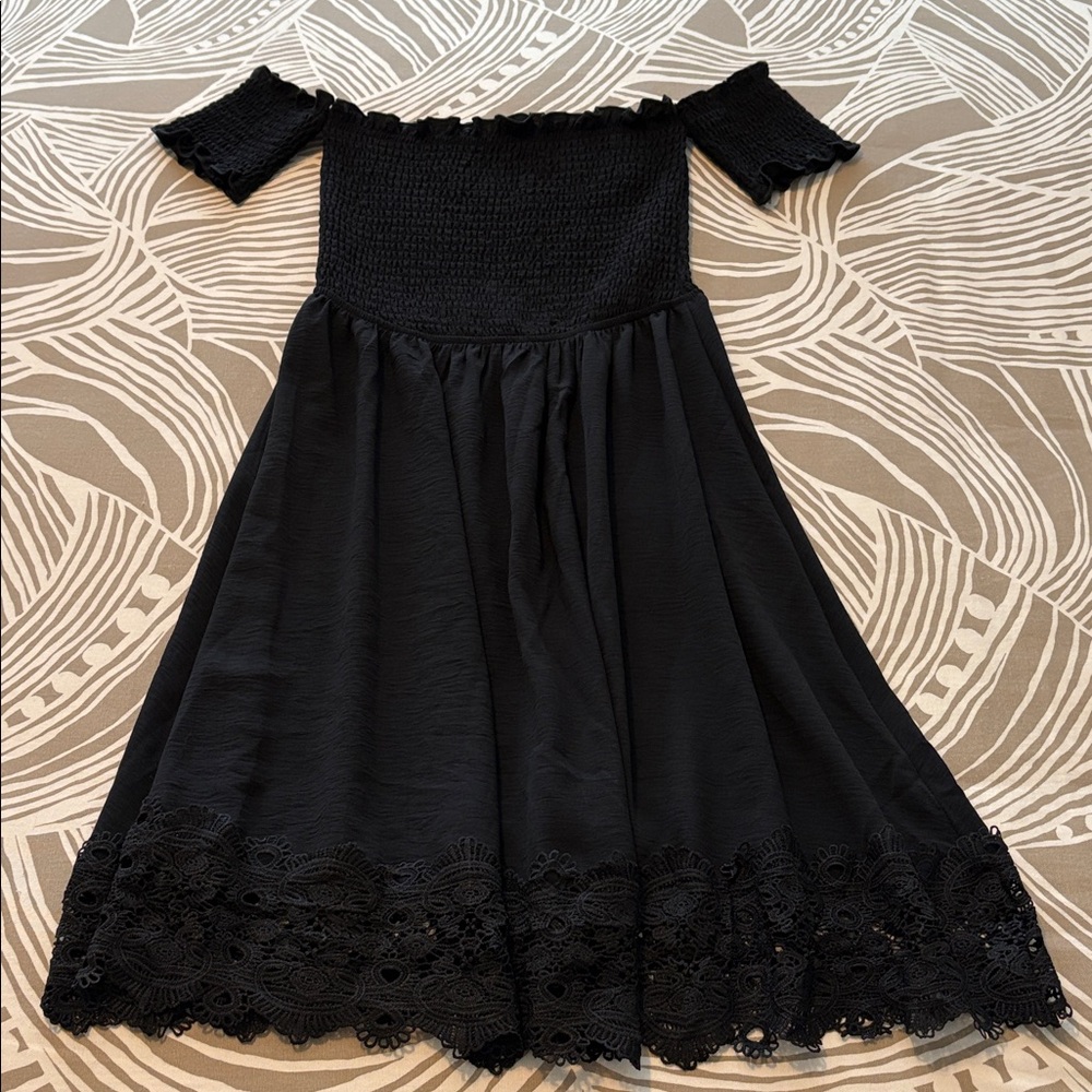 Black dress, smocking and lace